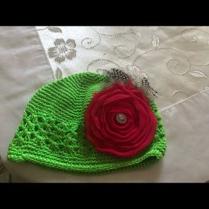 NWOT Soft crochet baby girl hat with feather attached